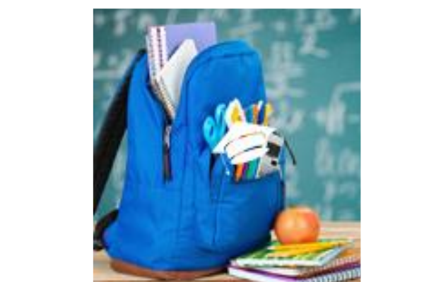 zaino pieno di materiale scolastico