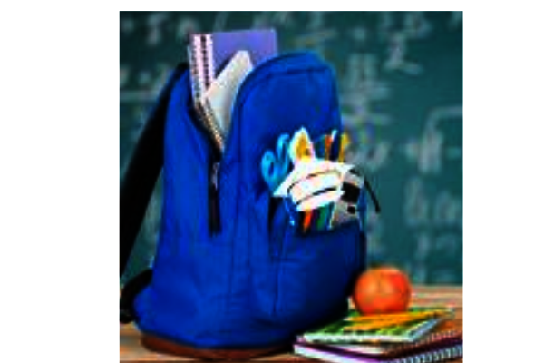 zaino pieno di materiale scolastico